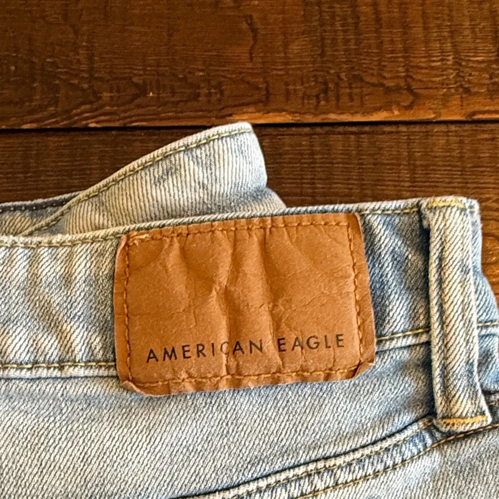American Eagle Outfitters Light Blue Jeans with Brown Patch - Picture 2 of 6